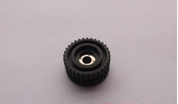 Il nero minuscolo KW1-M119L-000/KW1-M119L-00X dell'ingranaggio dell'alimentatore di YAMAHA CL8mm